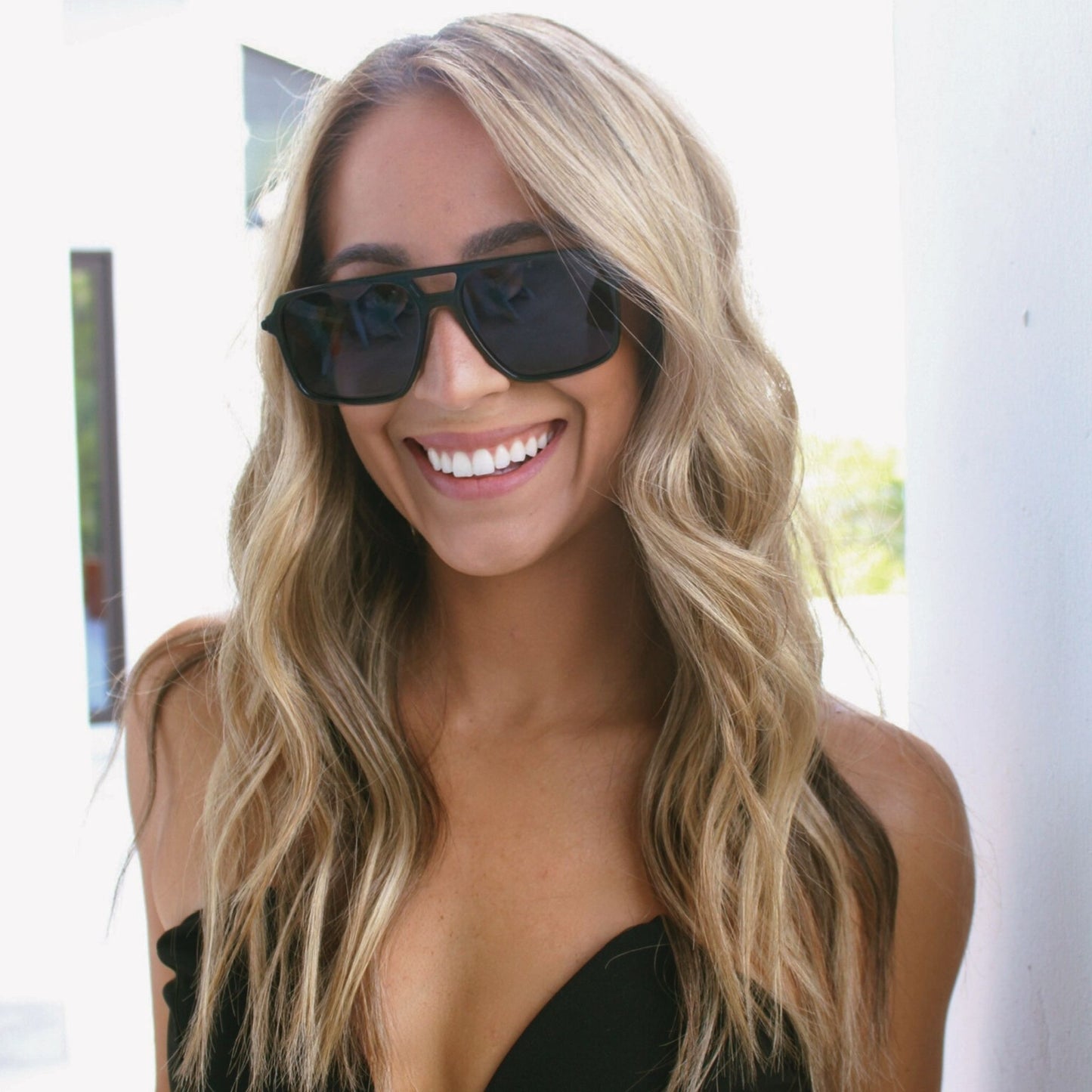 Black oversized square shaped sunglasses with metal arms