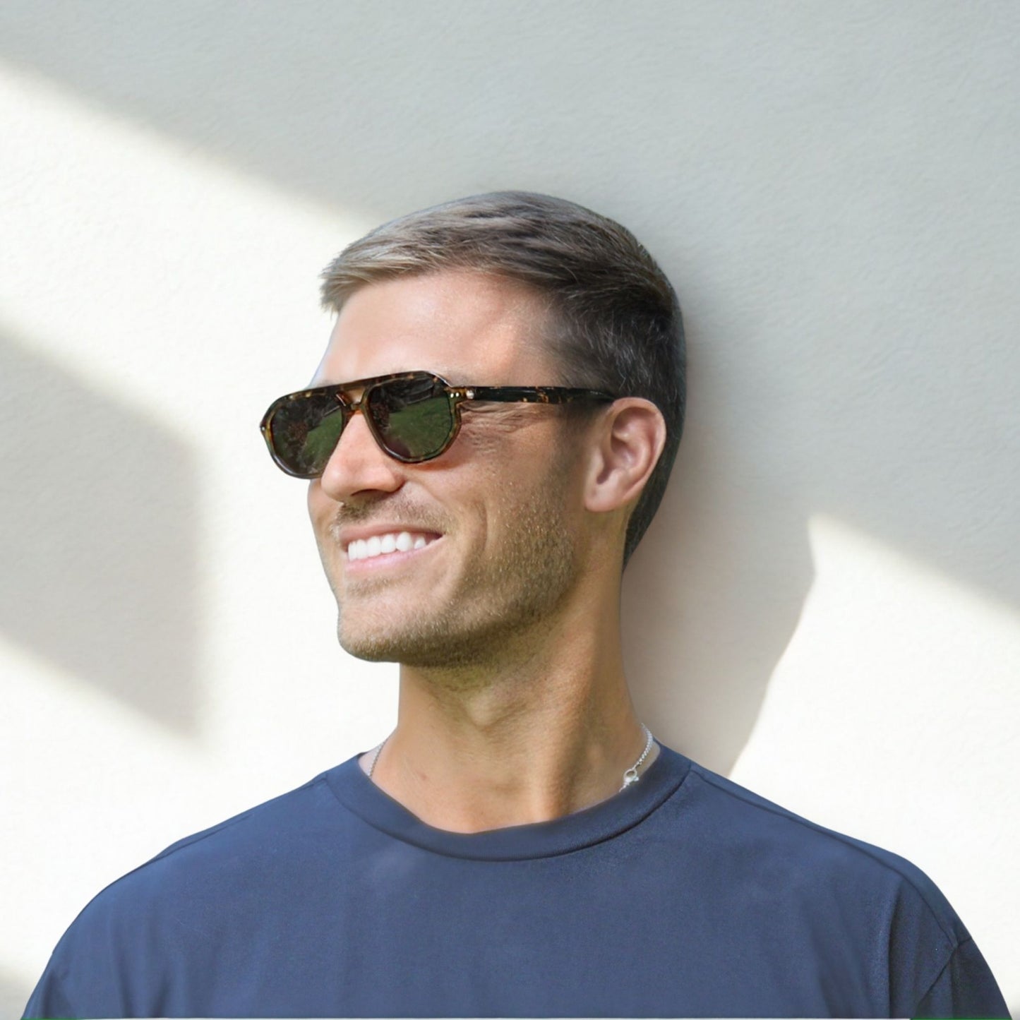Smaller geometric frame in tortoise with a black/grey lens