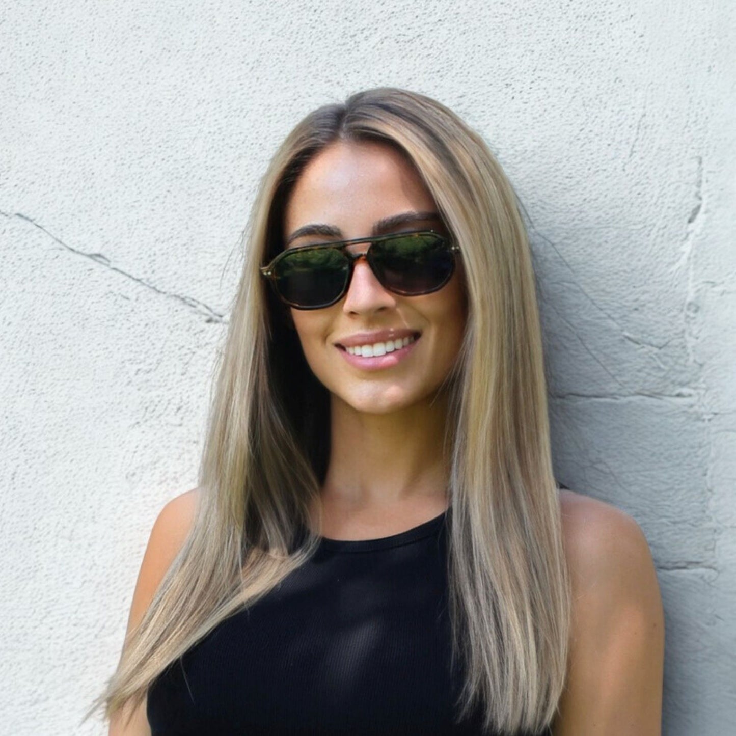 Smaller geometric frame in tortoise with a black/grey lens